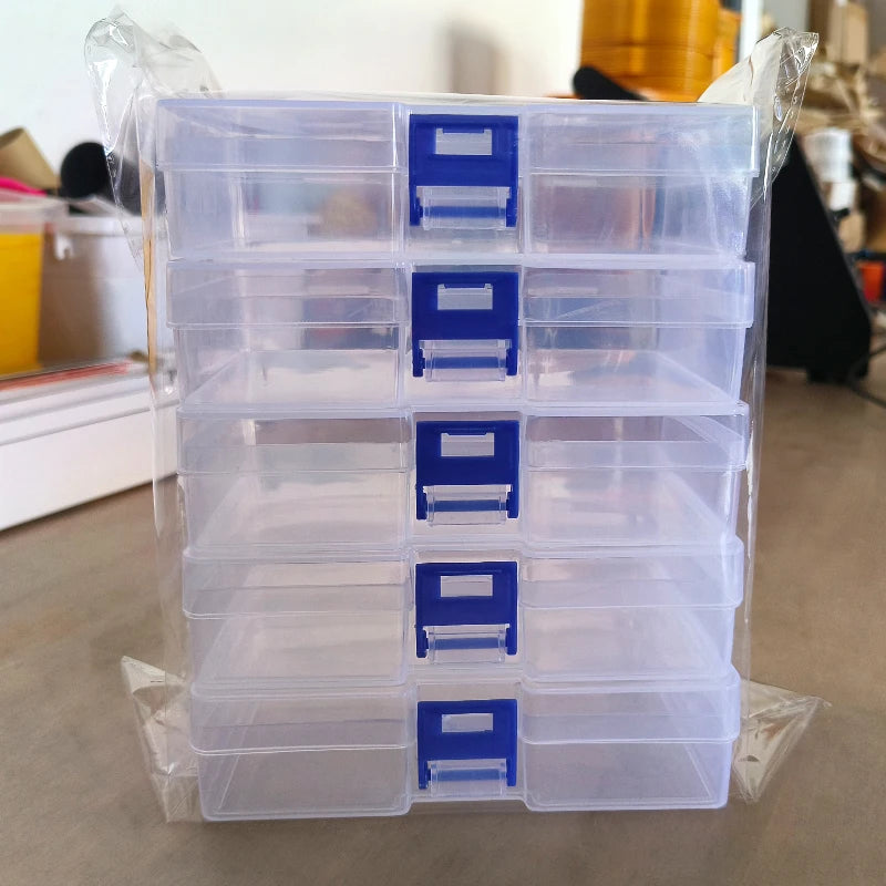 5 transparent plastic storage boxes